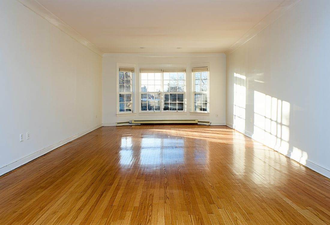 Empty living room, as photographed by the agent
